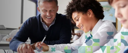teacher with two children in classroom