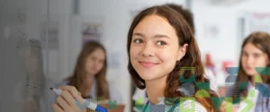 girl writing on whiteboard